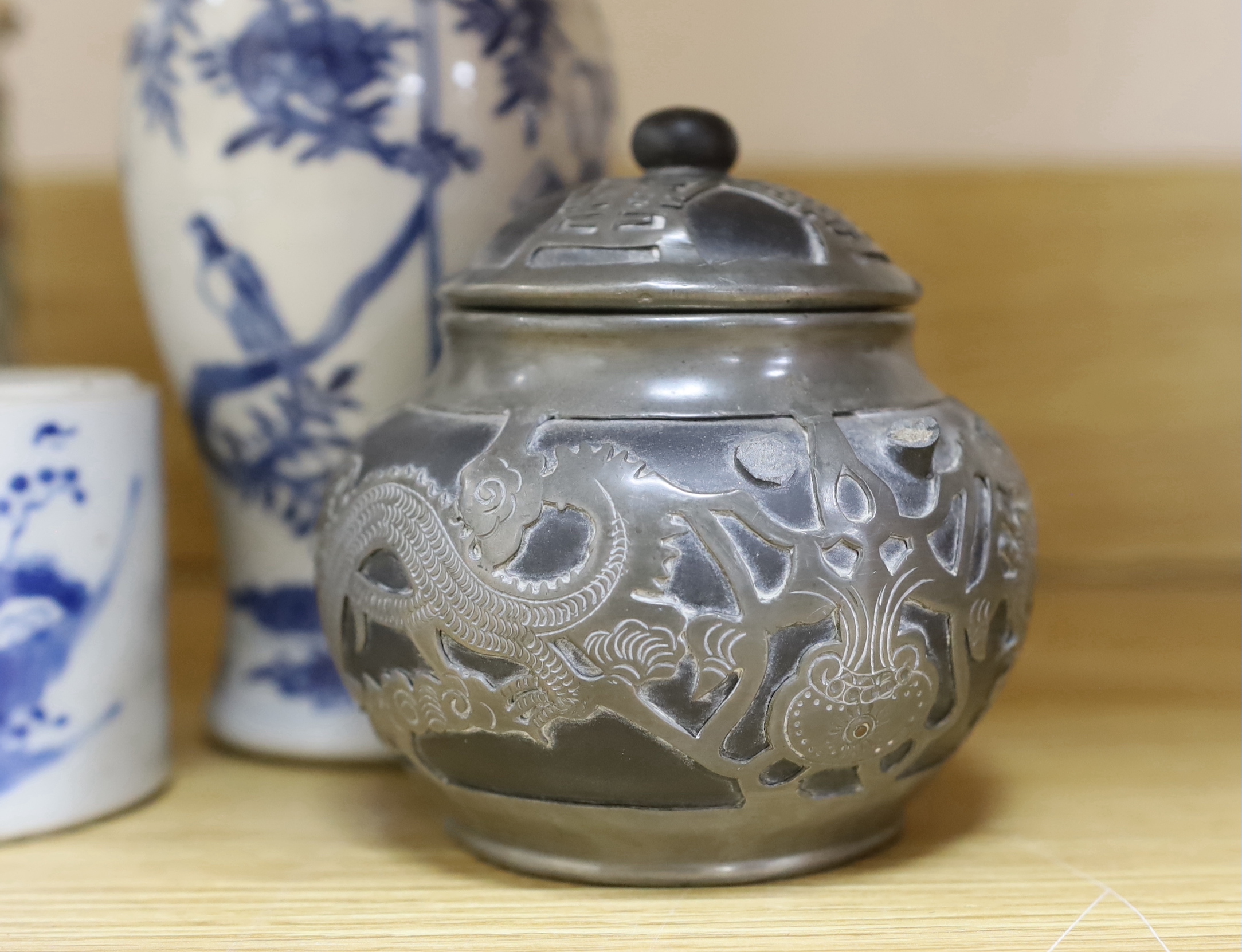 An early 20th century Chinese blue and white vase, a famille rose tea pot, etc. (5)